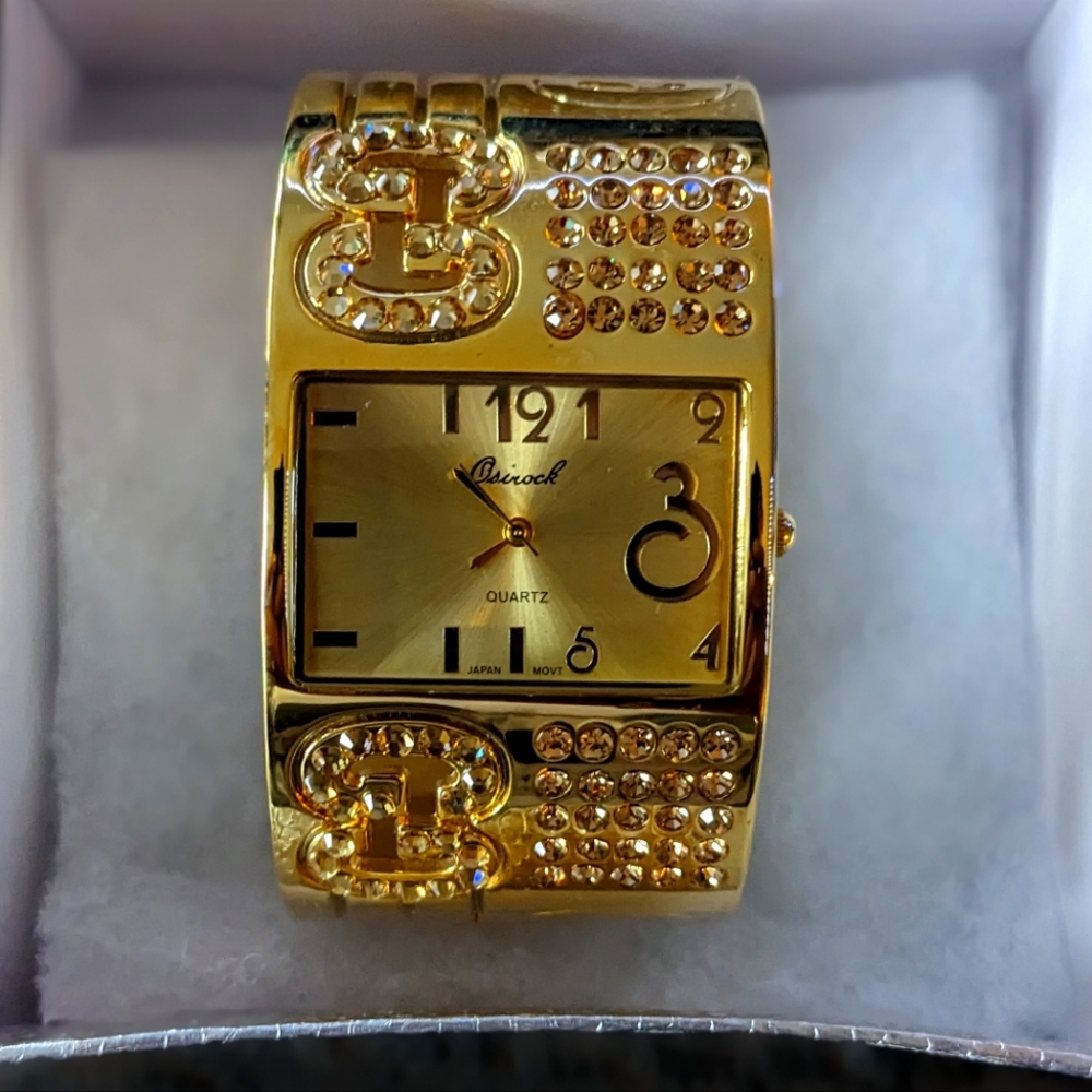 Gold colour watch